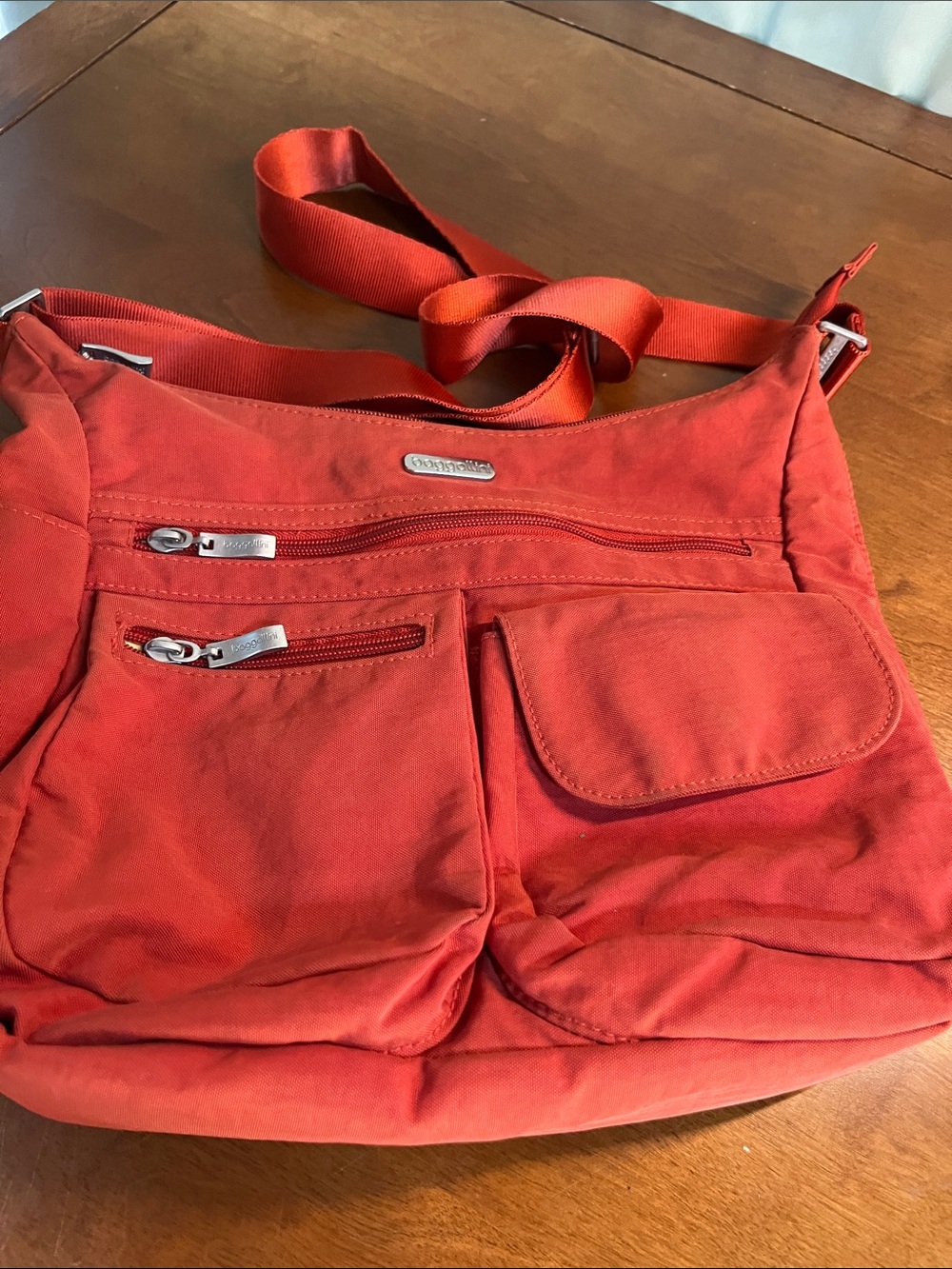 Baggallini Rust adjustable  Shoulder Bag with Multiple Front Pockets